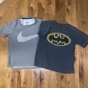 Two little boys small short sleeved tees.